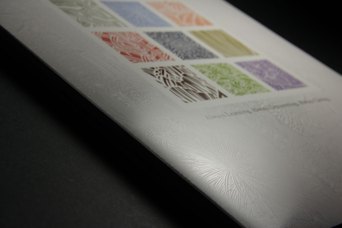 Beaumont Pocket Folder with flood gloss UV coating and spot dull UV varnish